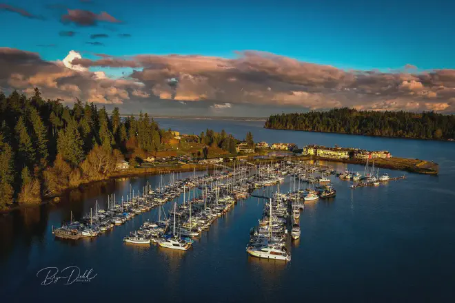 An aerial view of Port Ludlow Marina, looking out toward the entrance to beautiful Port Ludlow Bay.
