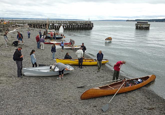 Inspecting boats on the beach