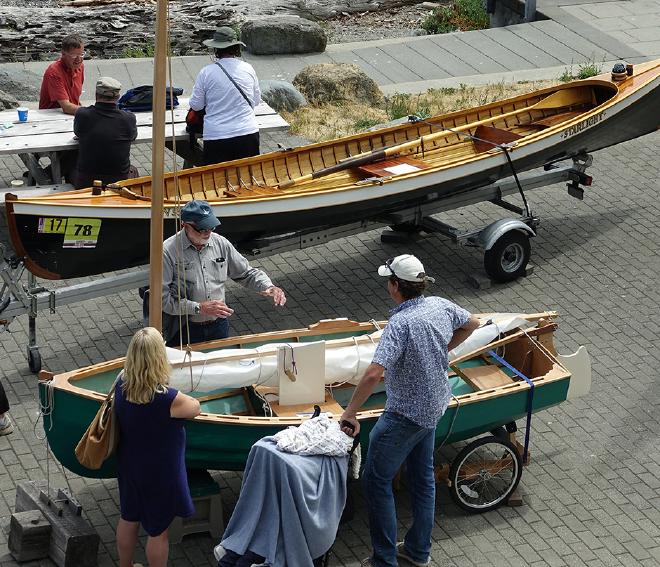 Inspecting boats on the beach