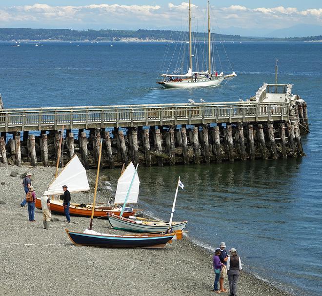 Inspecting boats on the beach