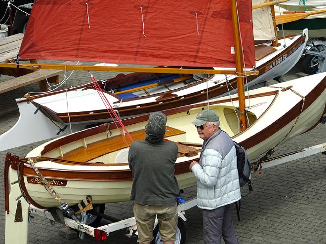 Inspecting boats on the beach