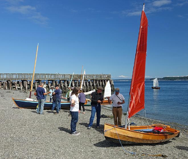 Inspecting boats on the beach